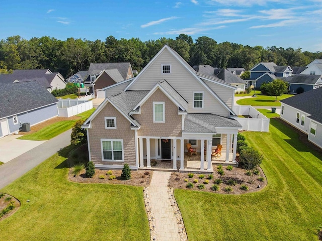 view of front of home featuring a front lawn