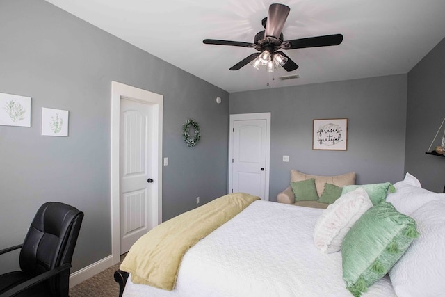 carpeted bedroom featuring ceiling fan