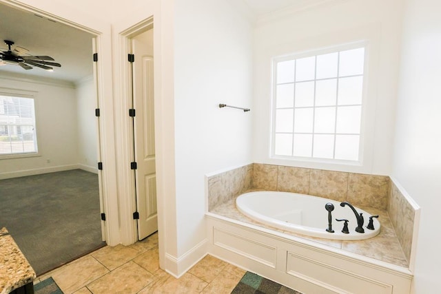 bathroom featuring a bath, crown molding, tile patterned floors, and ceiling fan