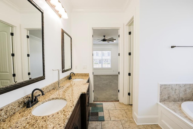 bathroom featuring vanity, a bathtub, crown molding, and tile patterned floors