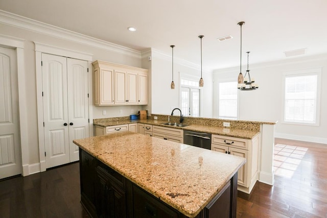 kitchen featuring sink, light stone counters, dishwasher, kitchen peninsula, and pendant lighting