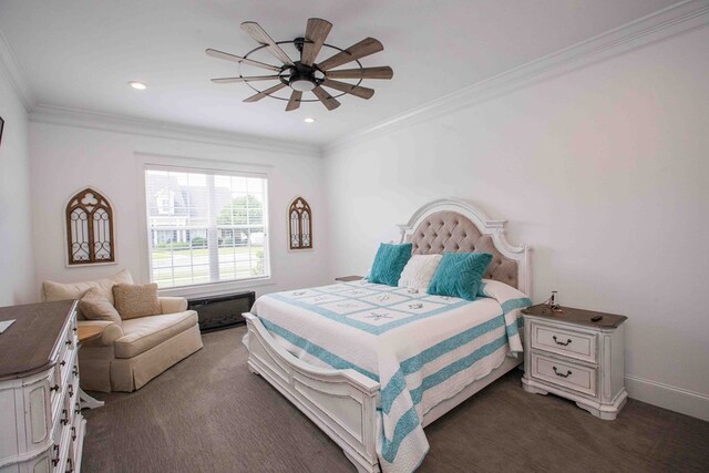 carpeted bedroom featuring ornamental molding and ceiling fan