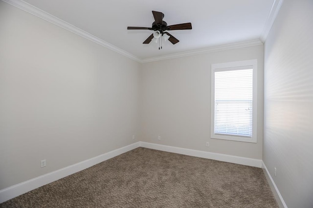 spare room featuring ornamental molding, ceiling fan, and carpet