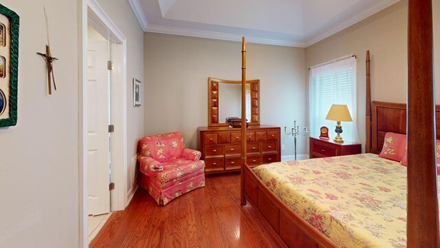 139 Summercreek Cv, Thomasville, GA 31792 - bedroom featuring light wood finished floors and ornamental molding