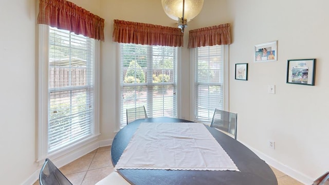 139 Summercreek Cv, Thomasville, GA 31792 - dining room with light tile patterned floors and baseboards