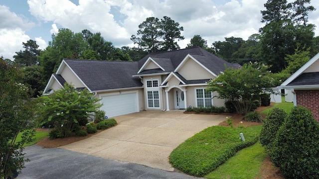 139 Summercreek Cv, Thomasville, GA 31792 - traditional home with stucco siding, driveway, and an attached garage