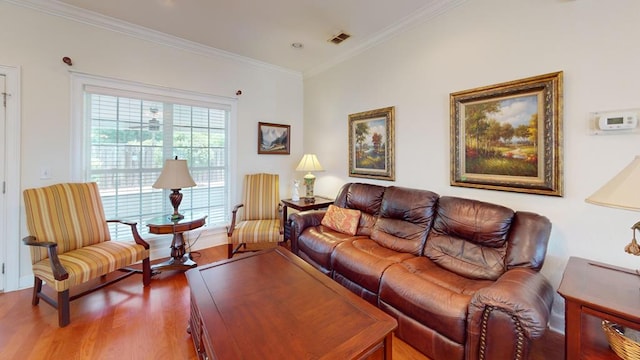 139 Summercreek Cv, Thomasville, GA 31792 - living area featuring wood finished floors and crown molding