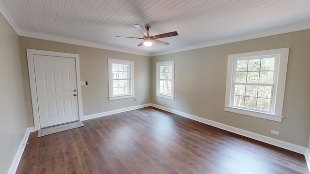 empty room with crown molding, ceiling fan, dark wood-type flooring, and wooden ceiling