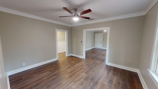 spare room with ornamental molding, dark hardwood / wood-style floors, and ceiling fan