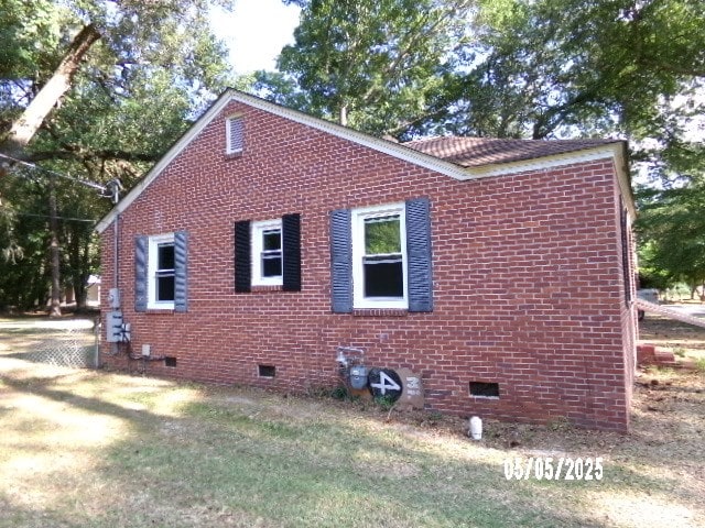 320 Camellia Ct, Camilla, GA 31730 - view of home's exterior featuring brick siding and crawl space