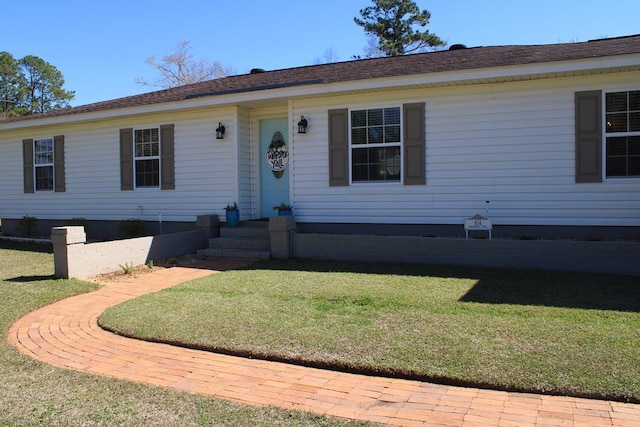 view of front facade with a front lawn