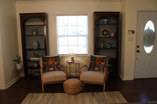 sitting room featuring dark wood-style floors and baseboards