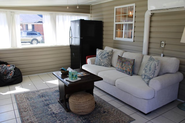 tiled living area featuring a wall unit AC