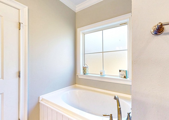 full bathroom with a garden tub and ornamental molding