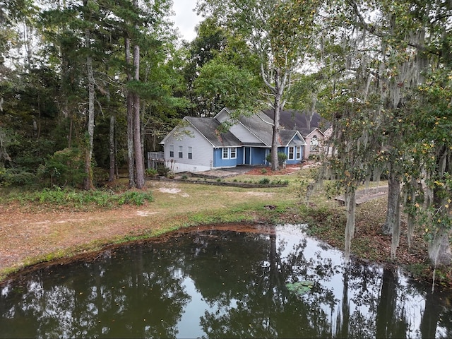 exterior space with a water view