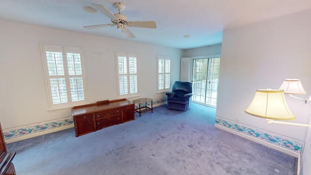 unfurnished room with ceiling fan, plenty of natural light, and carpet flooring