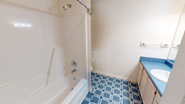 full bathroom featuring toilet, vanity, and shower / washtub combination