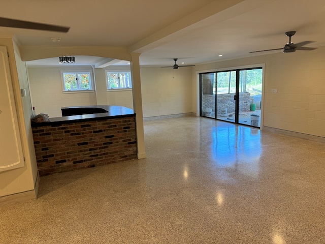 unfurnished room with ceiling fan