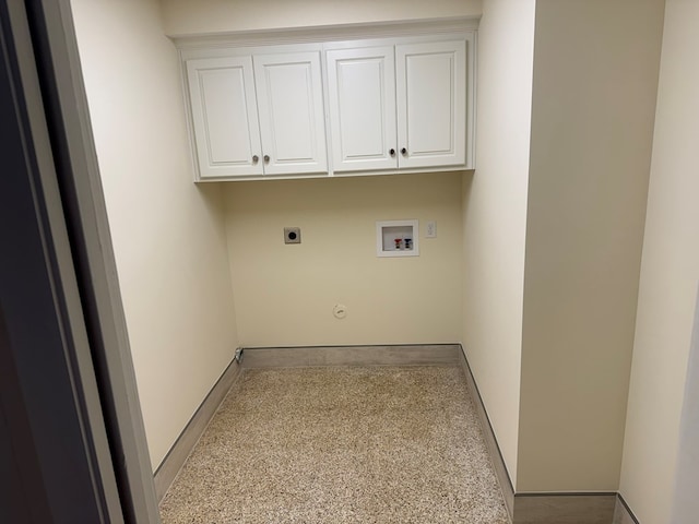 laundry room with hookup for a washing machine, hookup for an electric dryer, cabinets, and hookup for a gas dryer