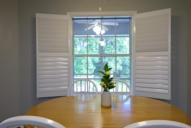 dining room with a ceiling fan
