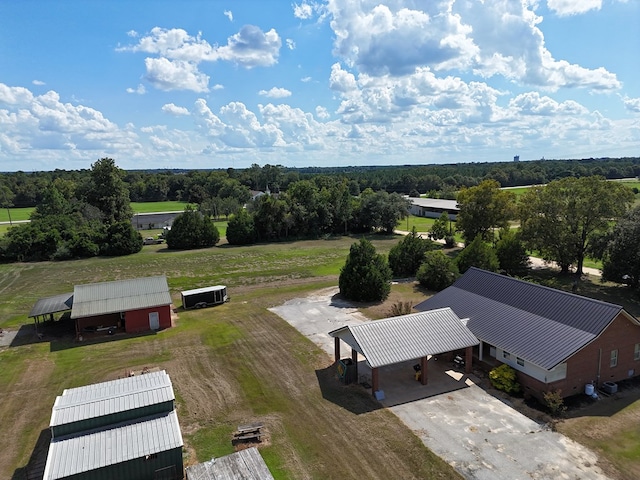 birds eye view of property featuring a rural view