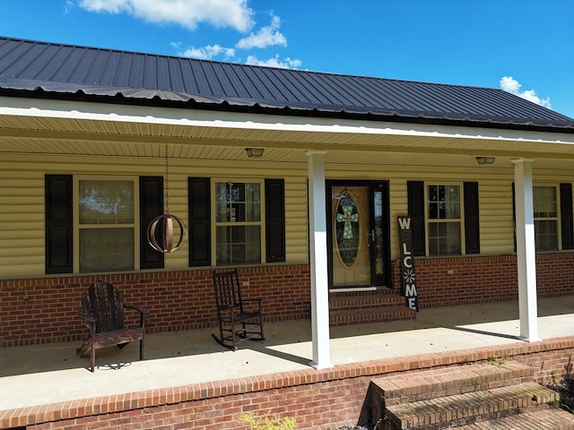 entrance to property with a porch