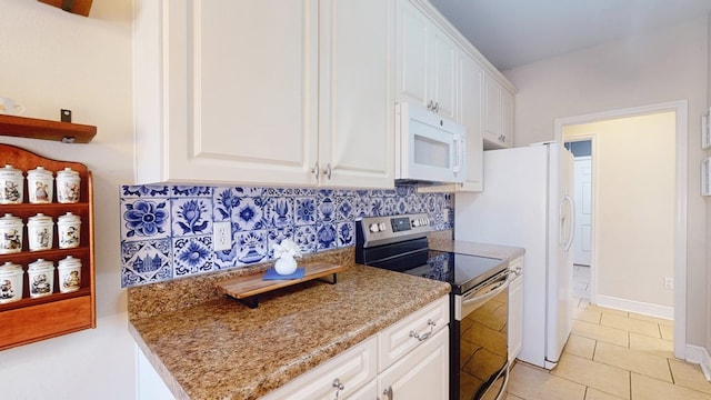 kitchen featuring white cabinetry, backsplash, light tile patterned floors, and stainless steel electric range oven