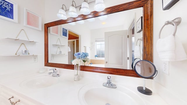 bathroom with vanity and a shower with shower door