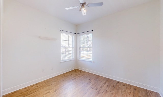 empty room with light hardwood / wood-style floors and ceiling fan