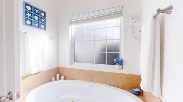 bathroom featuring a bath