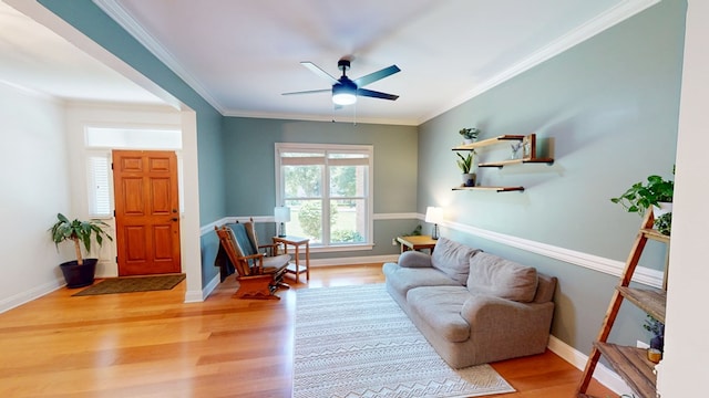 316 Bellingham Dr, Thomasville, GA 31792 - living area featuring light wood-style flooring, ceiling fan, and ornamental molding