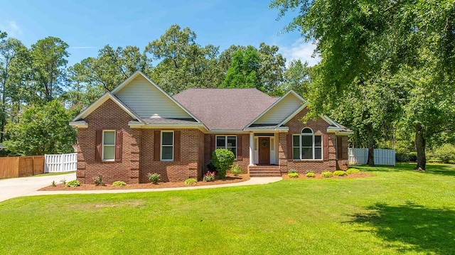 316 Bellingham Dr, Thomasville, GA 31792 - view of front facade featuring brick siding and roof with shingles