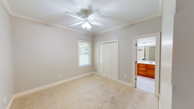 316 Bellingham Dr, Thomasville, GA 31792 - unfurnished bedroom featuring light colored carpet, crown molding, a closet, ensuite bath, and a ceiling fan