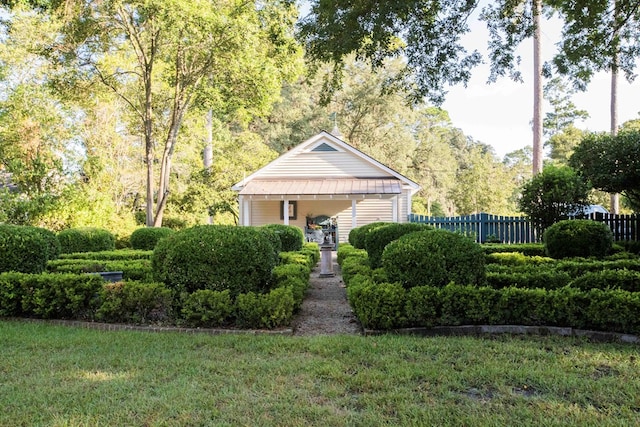 view of community featuring a yard