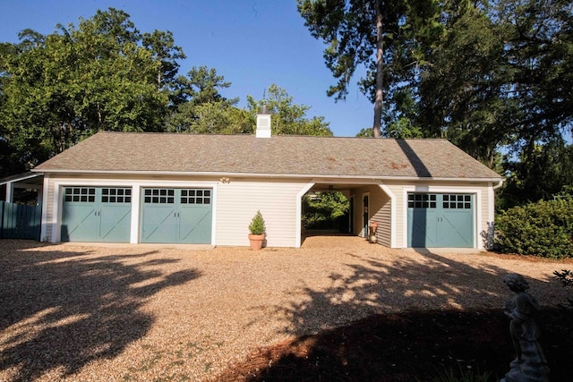 garage with a carport