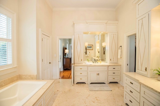 bathroom featuring vanity, a tub to relax in, and crown molding