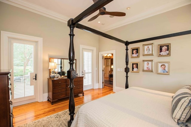 bedroom with ceiling fan, ornamental molding, and light hardwood / wood-style floors