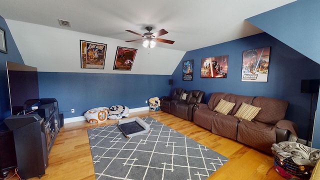 living room with vaulted ceiling, ceiling fan, and hardwood / wood-style floors