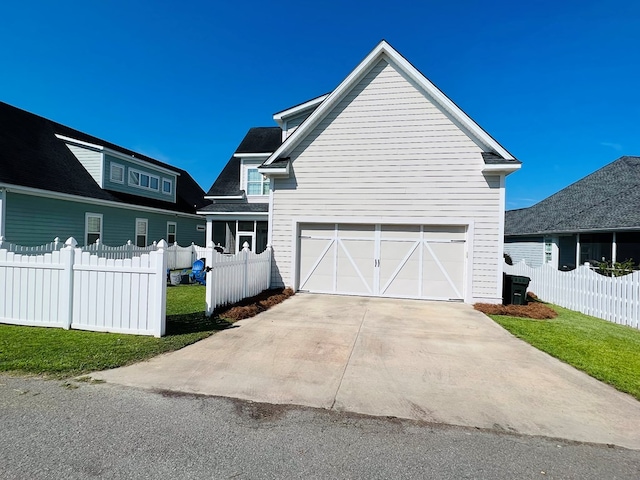 view of side of home featuring a yard