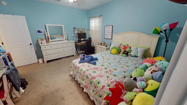 bedroom featuring light colored carpet