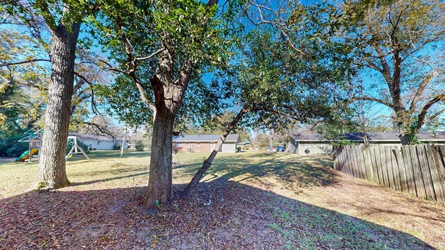 view of yard with a playground