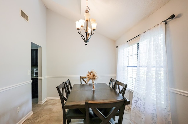 351 Plantation Ln, Thomasville, GA 31757 - dining area with vaulted ceiling and a chandelier