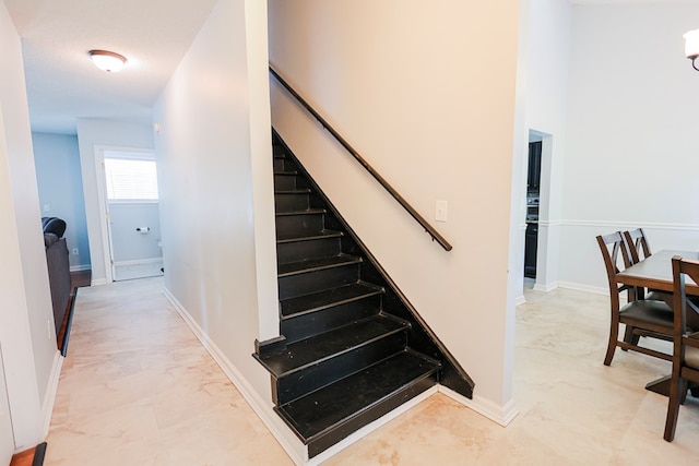 351 Plantation Ln, Thomasville, GA 31757 - staircase with marble finish floors and baseboards
