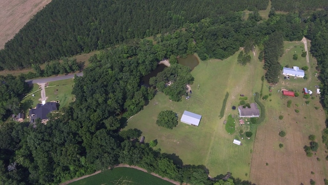 birds eye view of property featuring a rural view