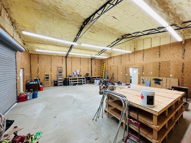 garage with a workshop area