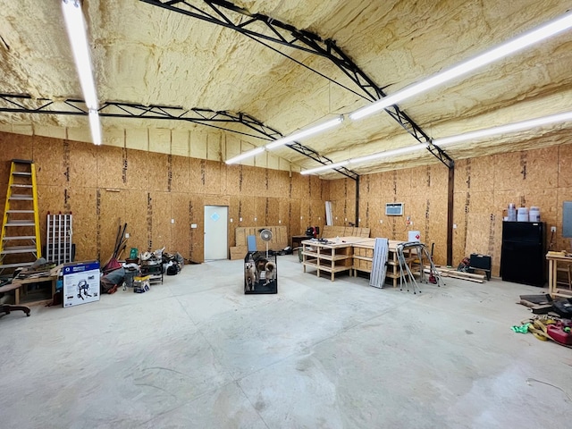 garage with a workshop area