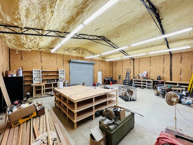 garage with a workshop area