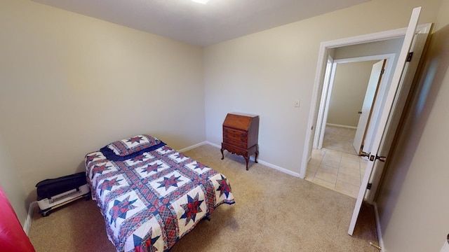 bedroom with light carpet