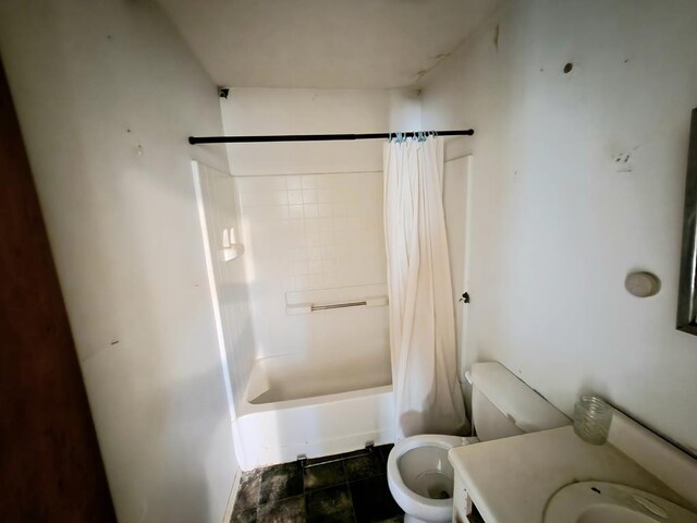 full bathroom featuring shower / tub combo, vanity, and toilet