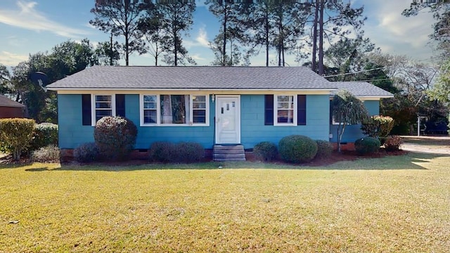 ranch-style home with entry steps, crawl space, and a front lawn